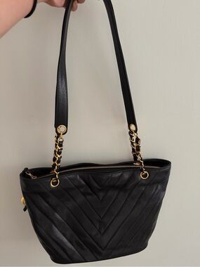 CHANEL Black caviar chevron leather, Shoulder Bag with Gold Chain Straps